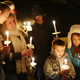 Mourners at a vigil after Sandy Hook, December 2012. Photo via AP
